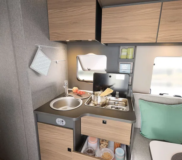 The galley kitchen inside the Grand Tourer
